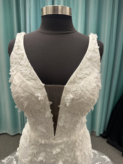 Stella York SY8157 glitter tulle fit-and-flare wedding dress with plunge neckline and floral lace appliqués