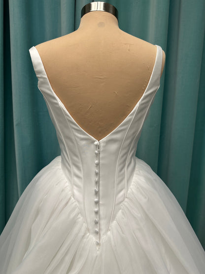 Stella York SY8222 ballgown wedding dress with scoop neckline, structured Mikado bodice, basque waist, and full organza skirt