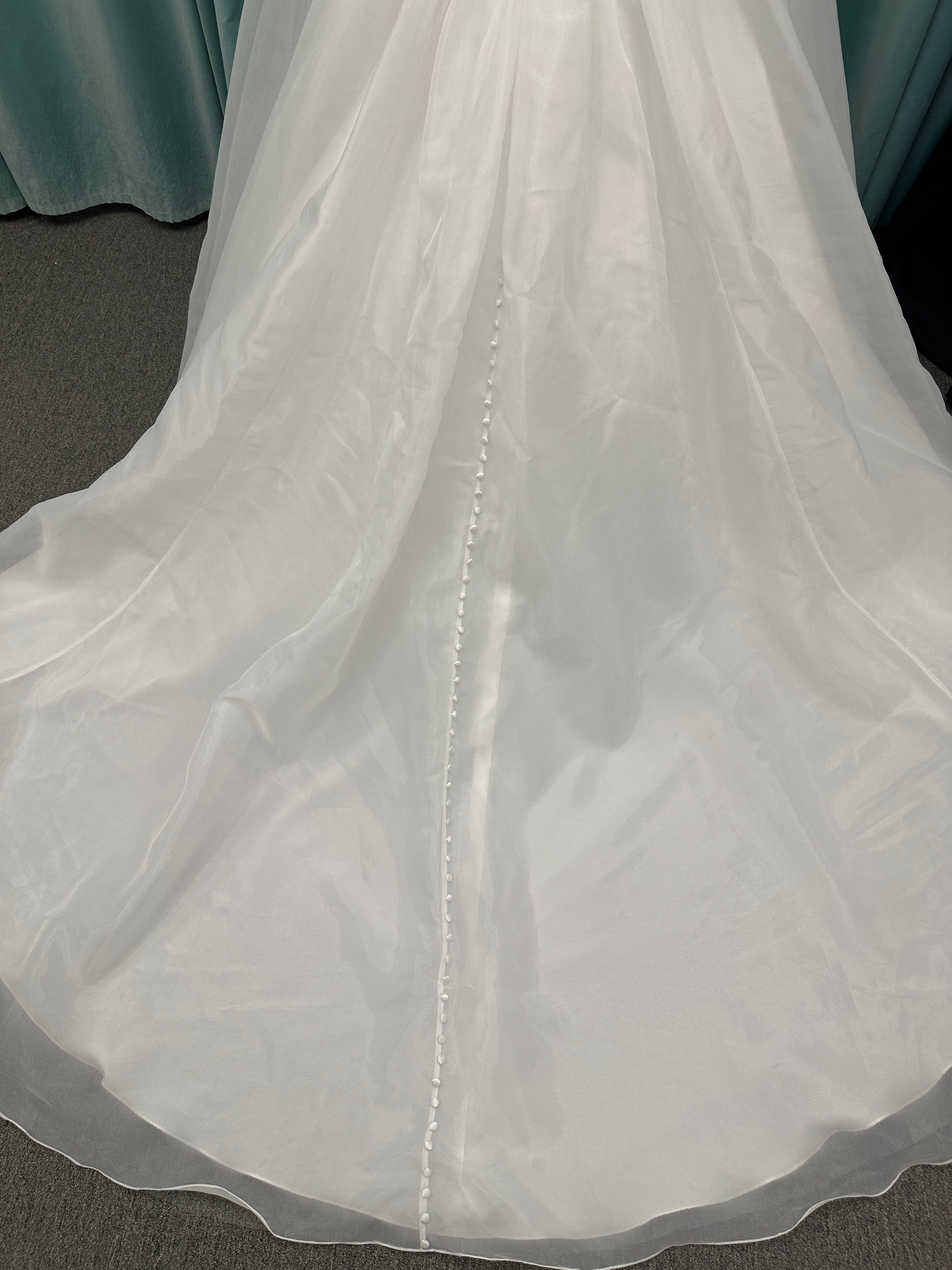 Stella York SY8222 ballgown wedding dress with scoop neckline, structured Mikado bodice, basque waist, and full organza skirt