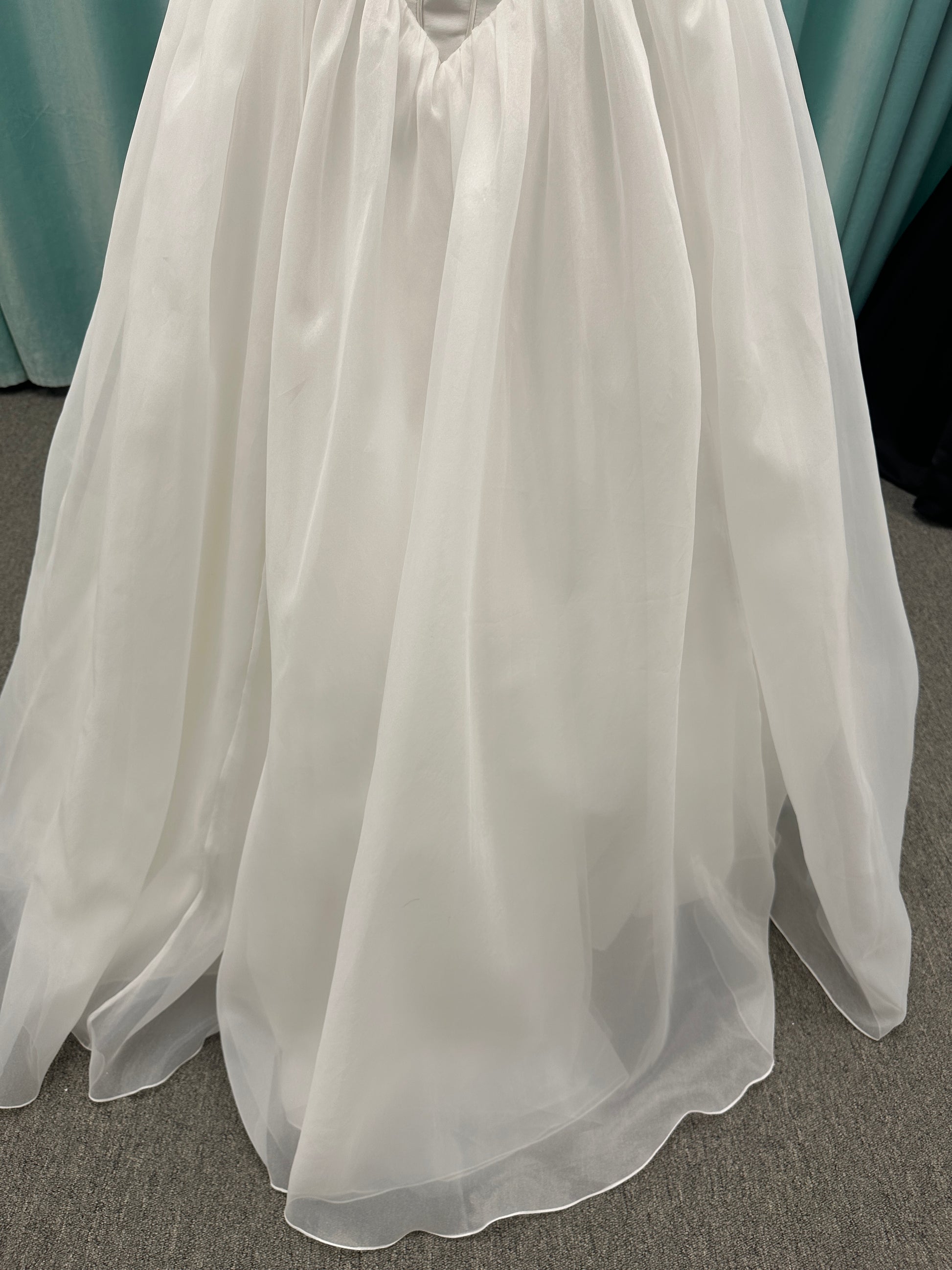 Stella York SY8222 ballgown wedding dress with scoop neckline, structured Mikado bodice, basque waist, and full organza skirt