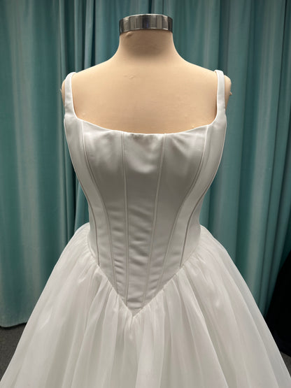 Stella York SY8222 ballgown wedding dress with scoop neckline, structured Mikado bodice, basque waist, and full organza skirt