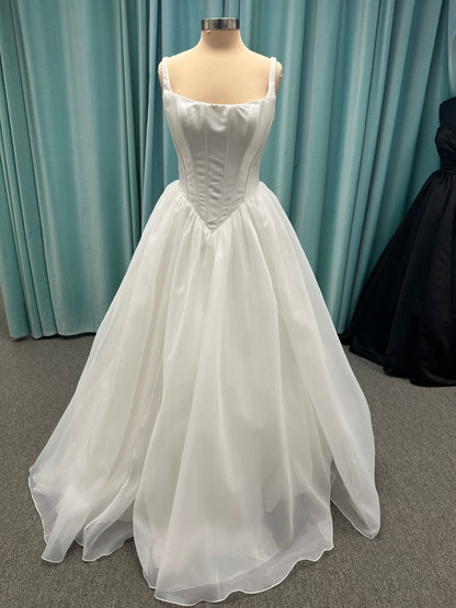 Stella York SY8222 ballgown wedding dress with scoop neckline, structured Mikado bodice, basque waist, and full organza skirt