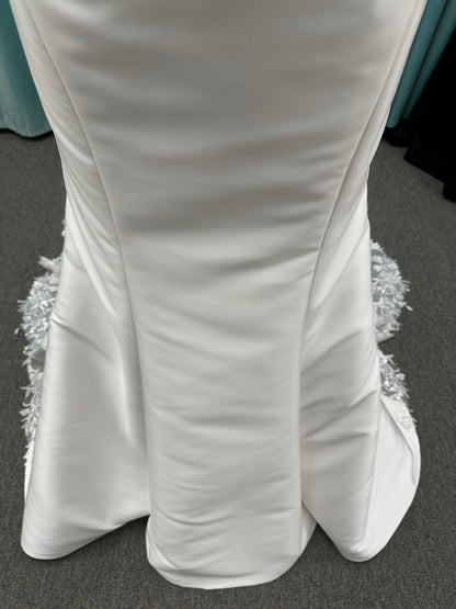 Strapless Mikado fit-and-flare wedding dress with corset bodice, exposed boning, lace detailing, and dramatic lace train by Stella York Style SY8163