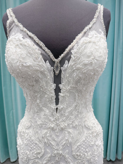 Morilee 2139 Sofia fit and flare wedding dress with crystal-trimmed deep V-neck, Alençon lace appliqués on Chantilly lace net, scalloped hem, and sheer train.