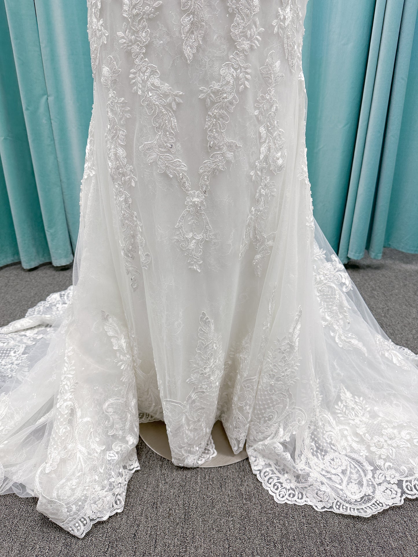 Morilee 2139 Sofia fit and flare wedding dress with crystal-trimmed deep V-neck, Alençon lace appliqués on Chantilly lace net, scalloped hem, and sheer train.