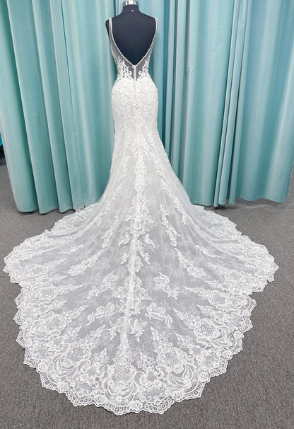 Morilee 2139 Sofia fit and flare wedding dress with crystal-trimmed deep V-neck, Alençon lace appliqués on Chantilly lace net, scalloped hem, and sheer train.
