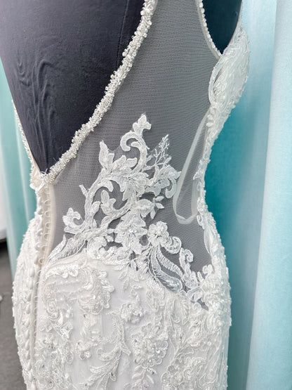 Morilee 2139 Sofia fit and flare wedding dress with crystal-trimmed deep V-neck, Alençon lace appliqués on Chantilly lace net, scalloped hem, and sheer train.