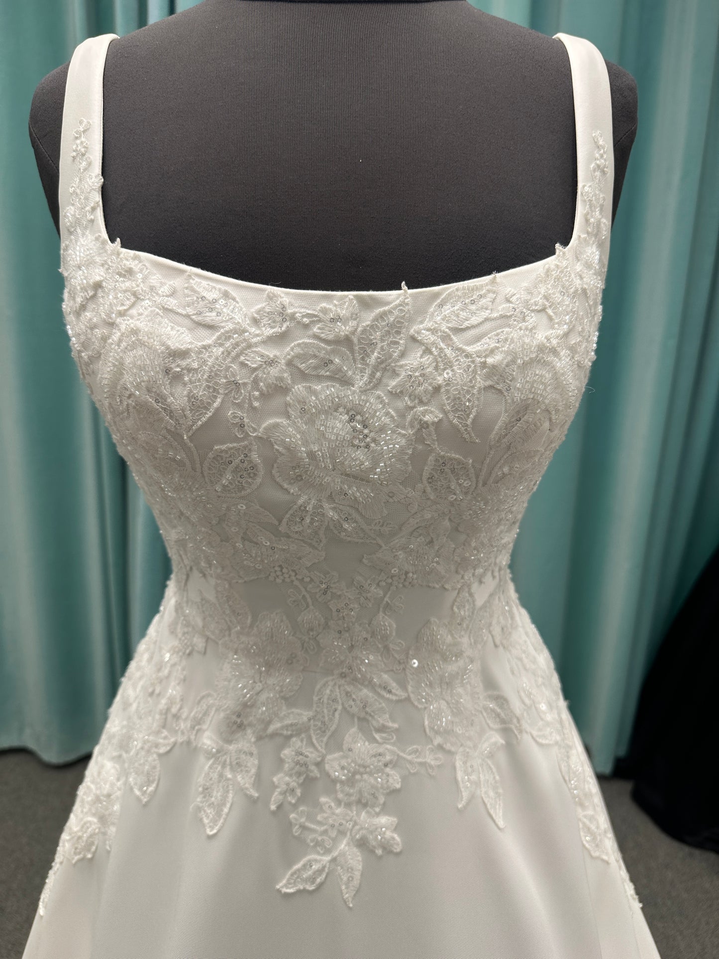 Stella York 7897 Mikado A-line wedding dress with square neckline, wide straps, lace bodice detail, and pockets