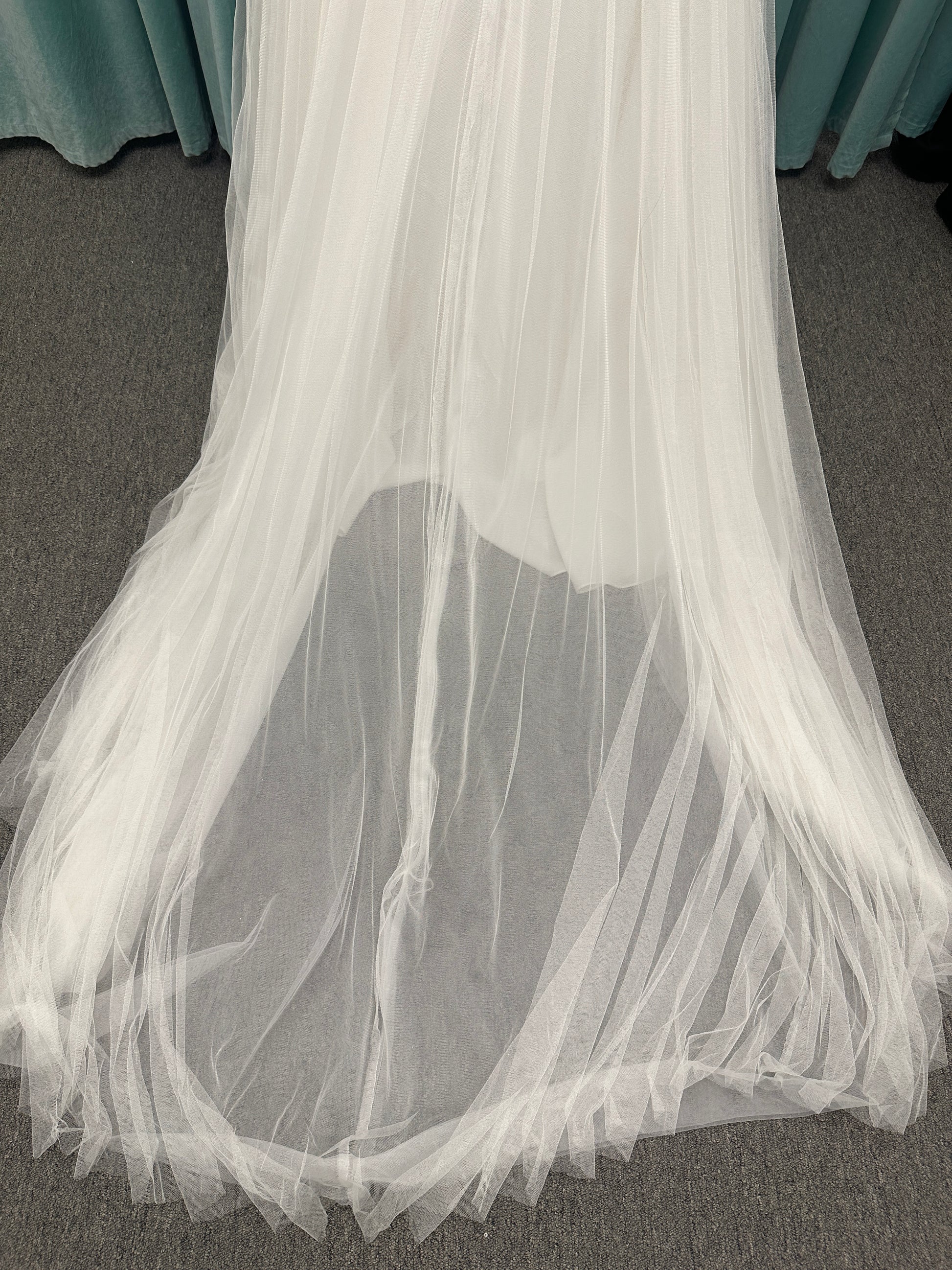 Stella York SY8113 colorful embroidered A-line wedding dress with twisted knot sweetheart neckline, sheer bodice, and soft pink tulle skirt