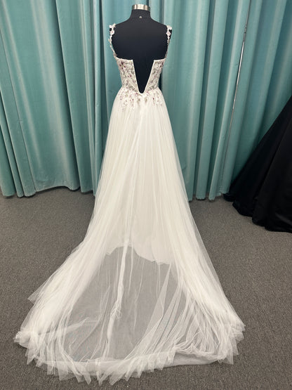 Stella York SY8113 colorful embroidered A-line wedding dress with twisted knot sweetheart neckline, sheer bodice, and soft pink tulle skirt