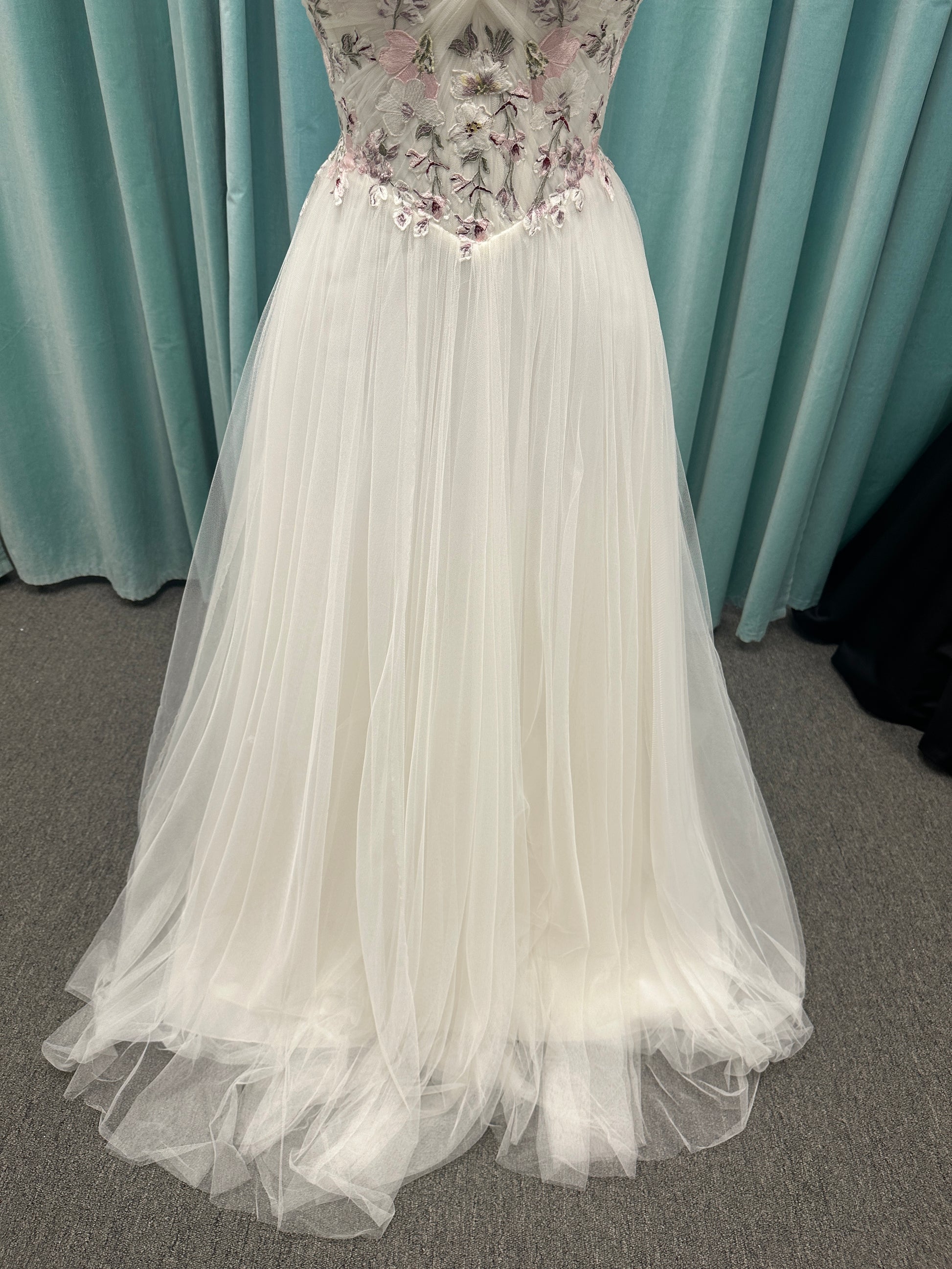Stella York SY8113 colorful embroidered A-line wedding dress with twisted knot sweetheart neckline, sheer bodice, and soft pink tulle skirt