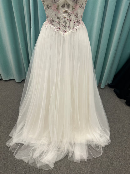 Stella York SY8113 colorful embroidered A-line wedding dress with twisted knot sweetheart neckline, sheer bodice, and soft pink tulle skirt