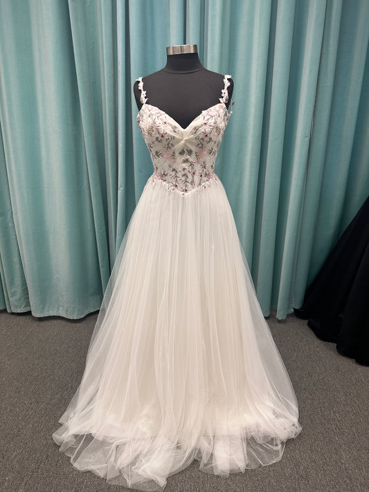 Stella York SY8113 colorful embroidered A-line wedding dress with twisted knot sweetheart neckline, sheer bodice, and soft pink tulle skirt