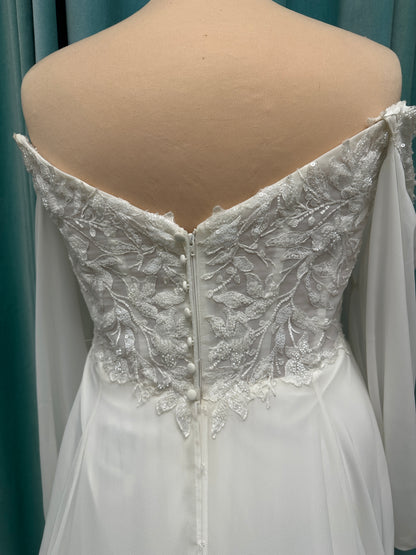 Plus size lace A-line wedding dress with detachable long blouson sleeves and flowing chiffon skirt