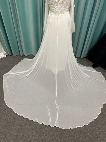 Plus size lace A-line wedding dress with detachable long blouson sleeves and flowing chiffon skirt