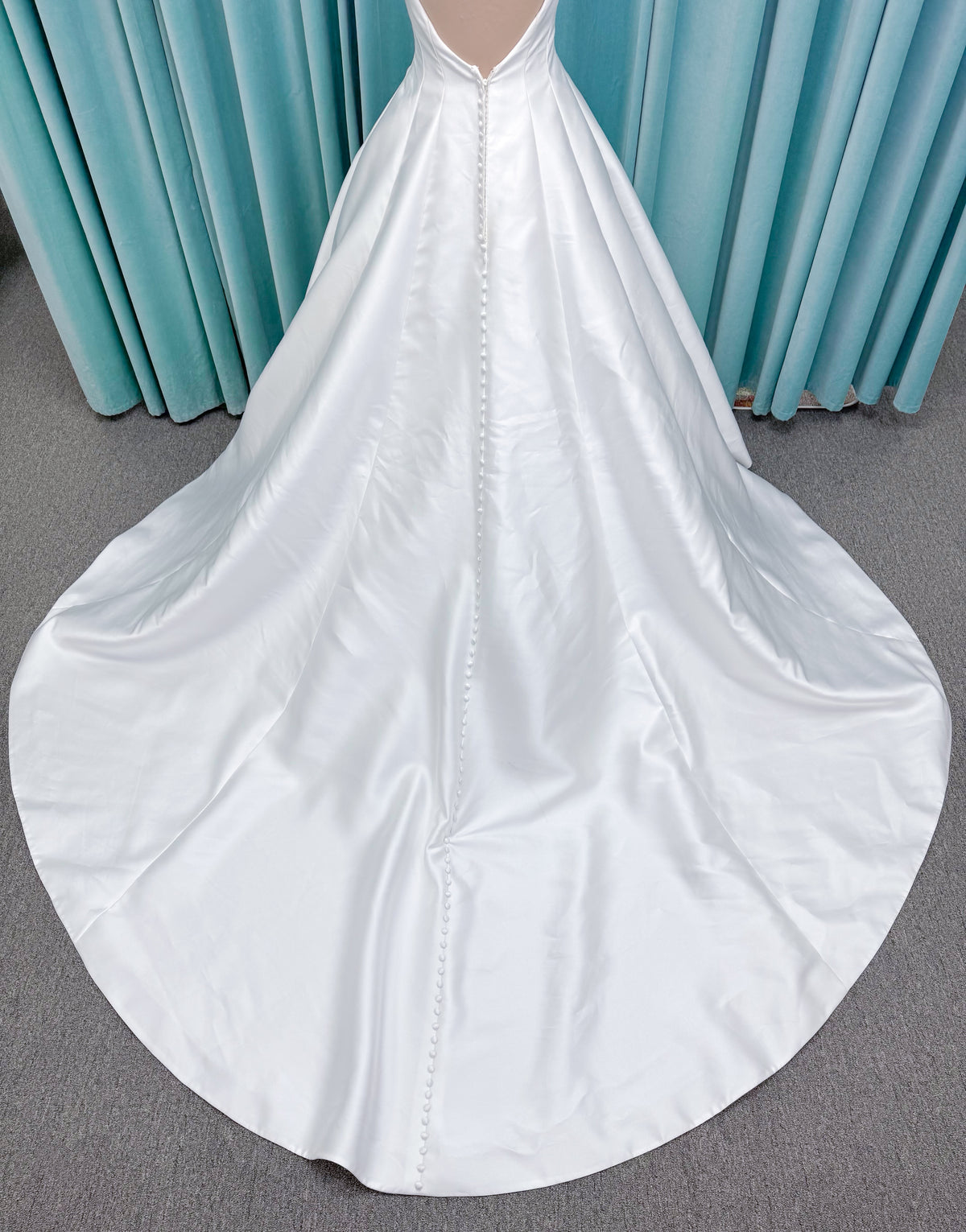 Morilee 1050007 Sylvia modest A-line wedding dress on mannequin with high neckline, crystal and pearl beaded embroidery, and flowing chiffon skirt