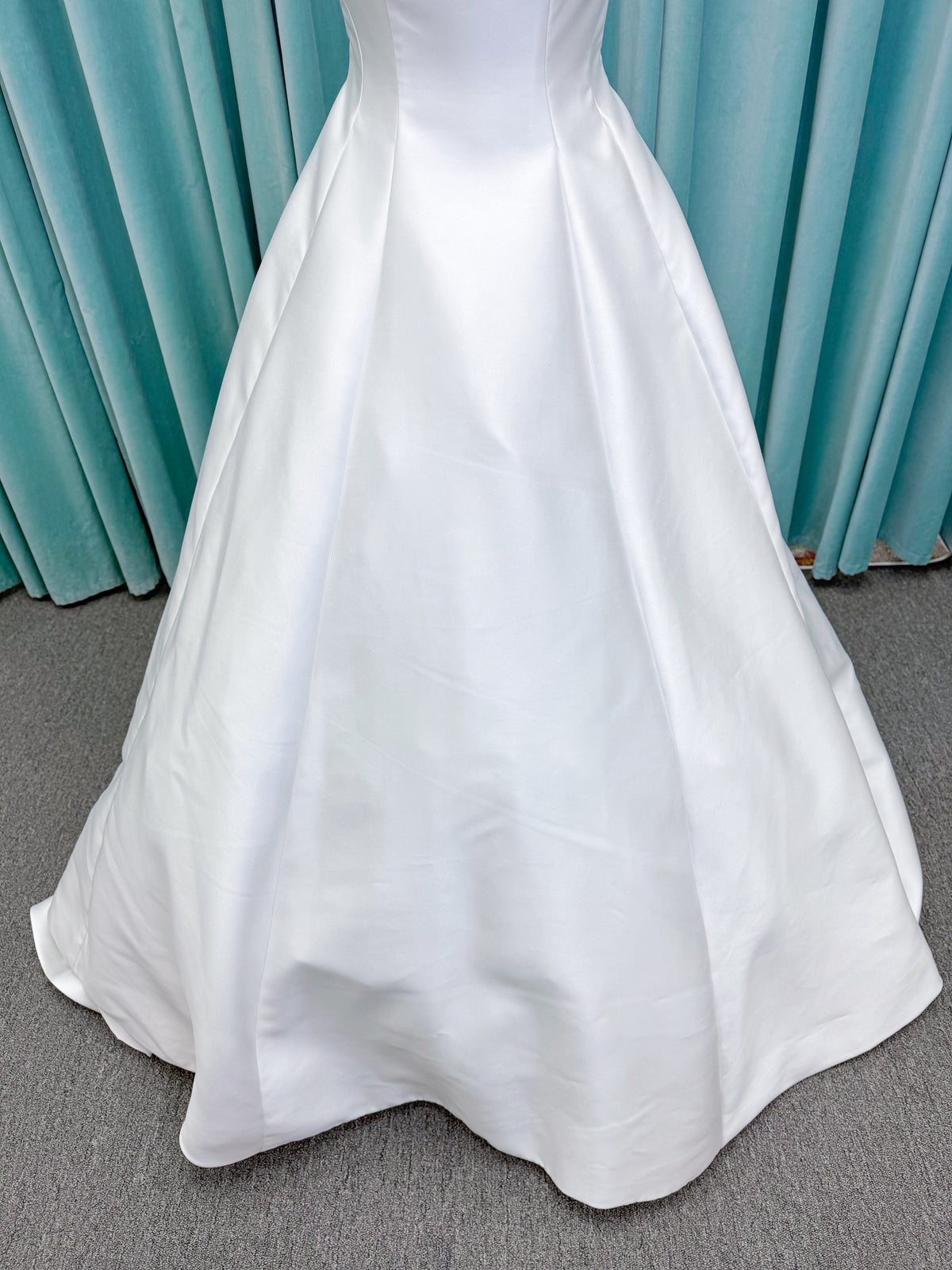 Morilee 1050007 Sylvia modest A-line wedding dress on mannequin with high neckline, crystal and pearl beaded embroidery, and flowing chiffon skirt