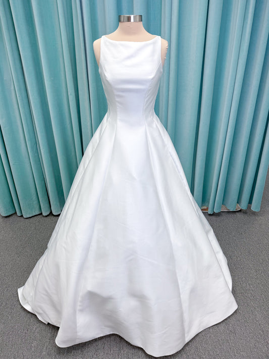 Morilee 1050007 Sylvia modest A-line wedding dress on mannequin with high neckline, crystal and pearl beaded embroidery, and flowing chiffon skirt