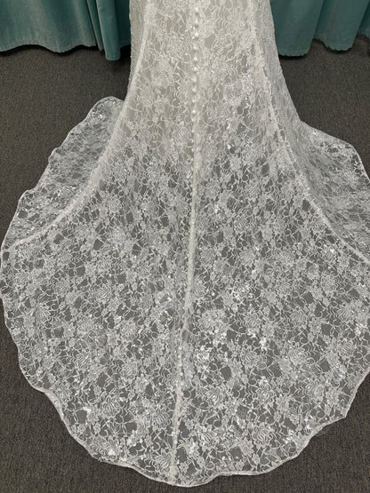 Stella York 7954 halter wedding dress with embellished floral lace, beaded detail, and fitted column silhouette with low back