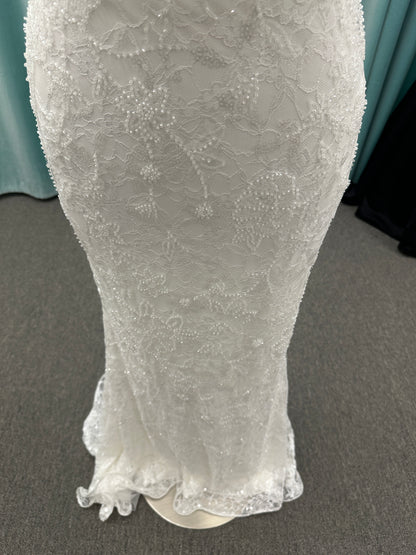 Stella York 7954 halter wedding dress with embellished floral lace, beaded detail, and fitted column silhouette with low back