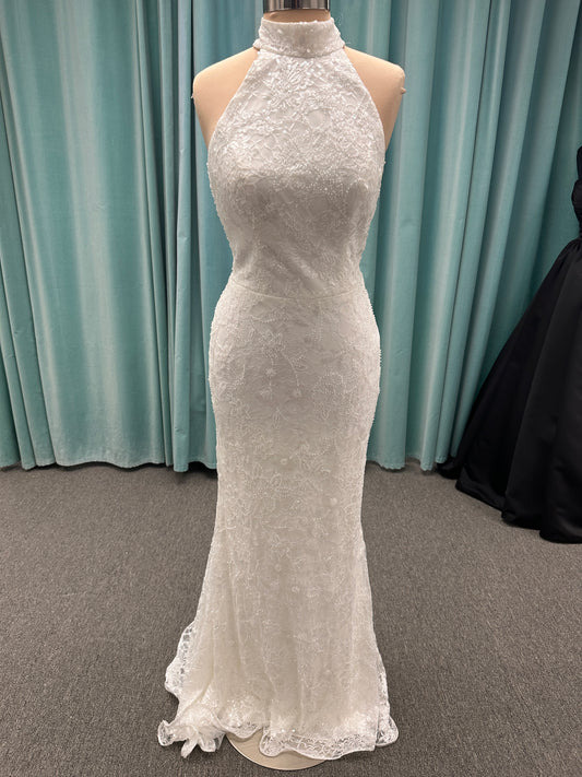 Stella York 7954 halter wedding dress with embellished floral lace, beaded detail, and fitted column silhouette with low back