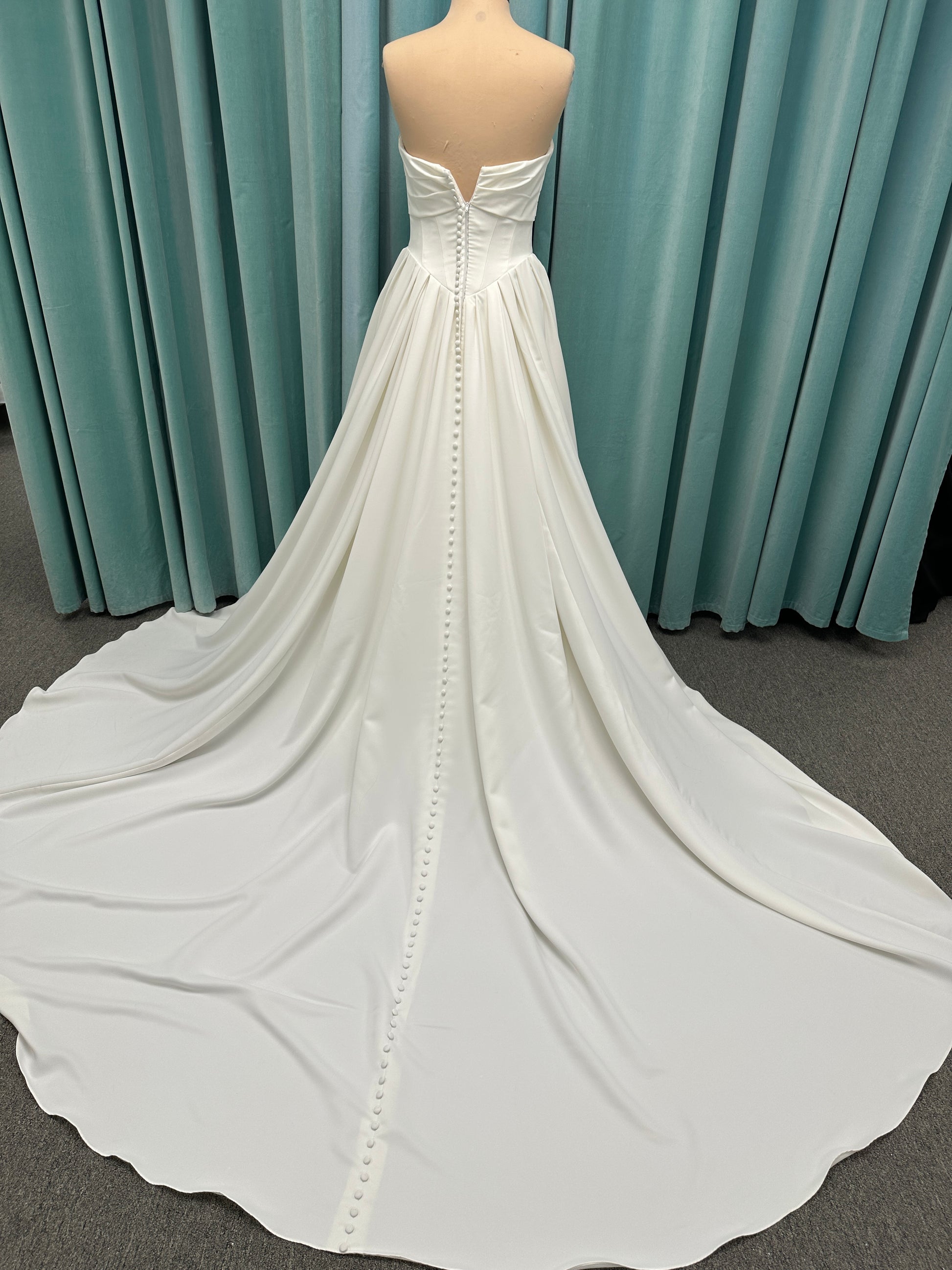 Essense of Australia D4269 matte satin A-line wedding dress with strapless draped bodice and Basque waist