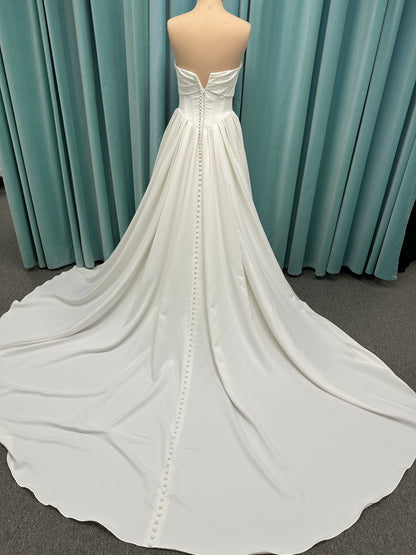 Essense of Australia D4269 matte satin A-line wedding dress with strapless draped bodice and Basque waist