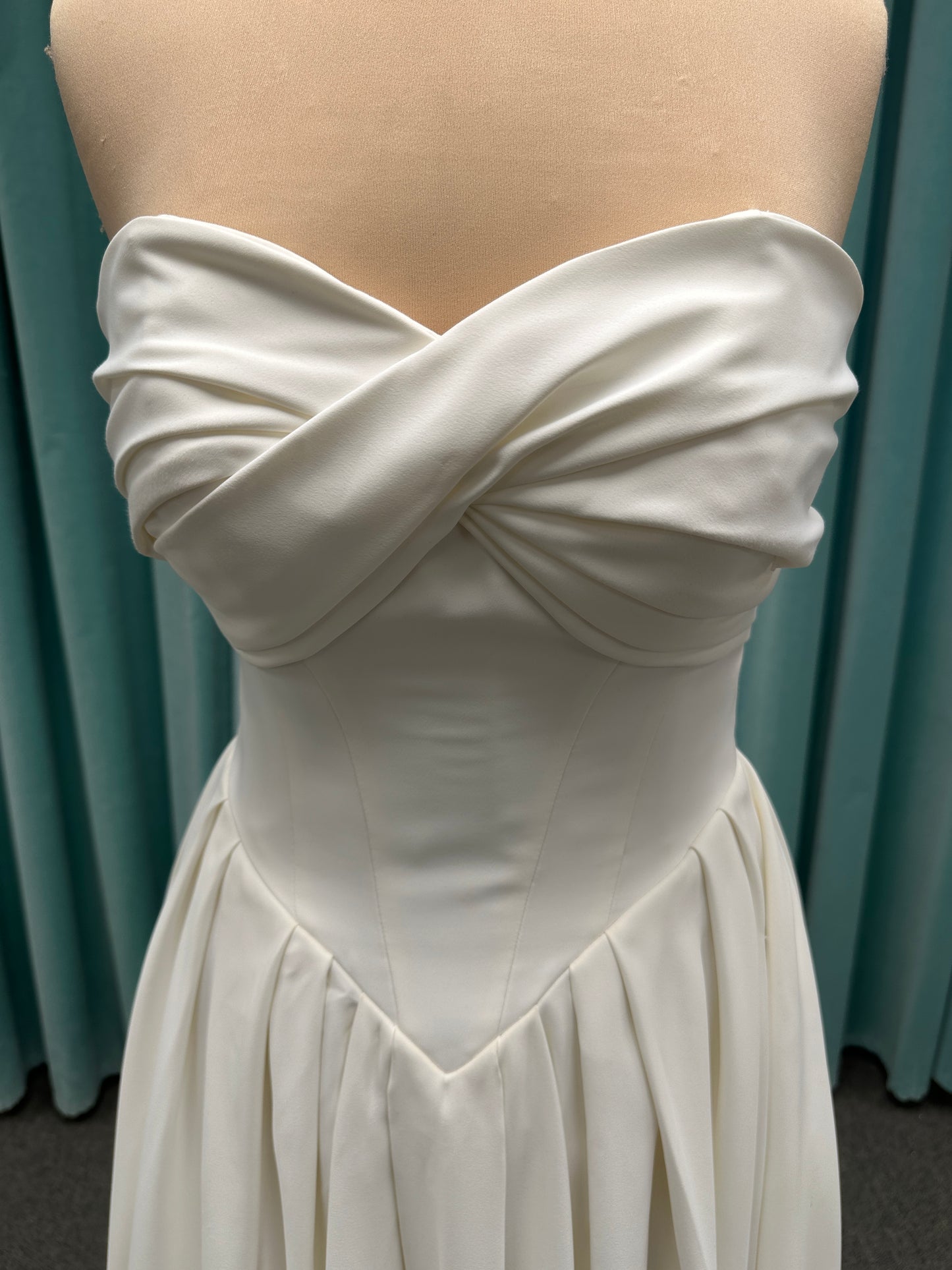 Essense of Australia D4269 matte satin A-line wedding dress with strapless draped bodice and Basque waist
