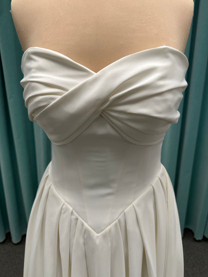 Essense of Australia D4269 matte satin A-line wedding dress with strapless draped bodice and Basque waist