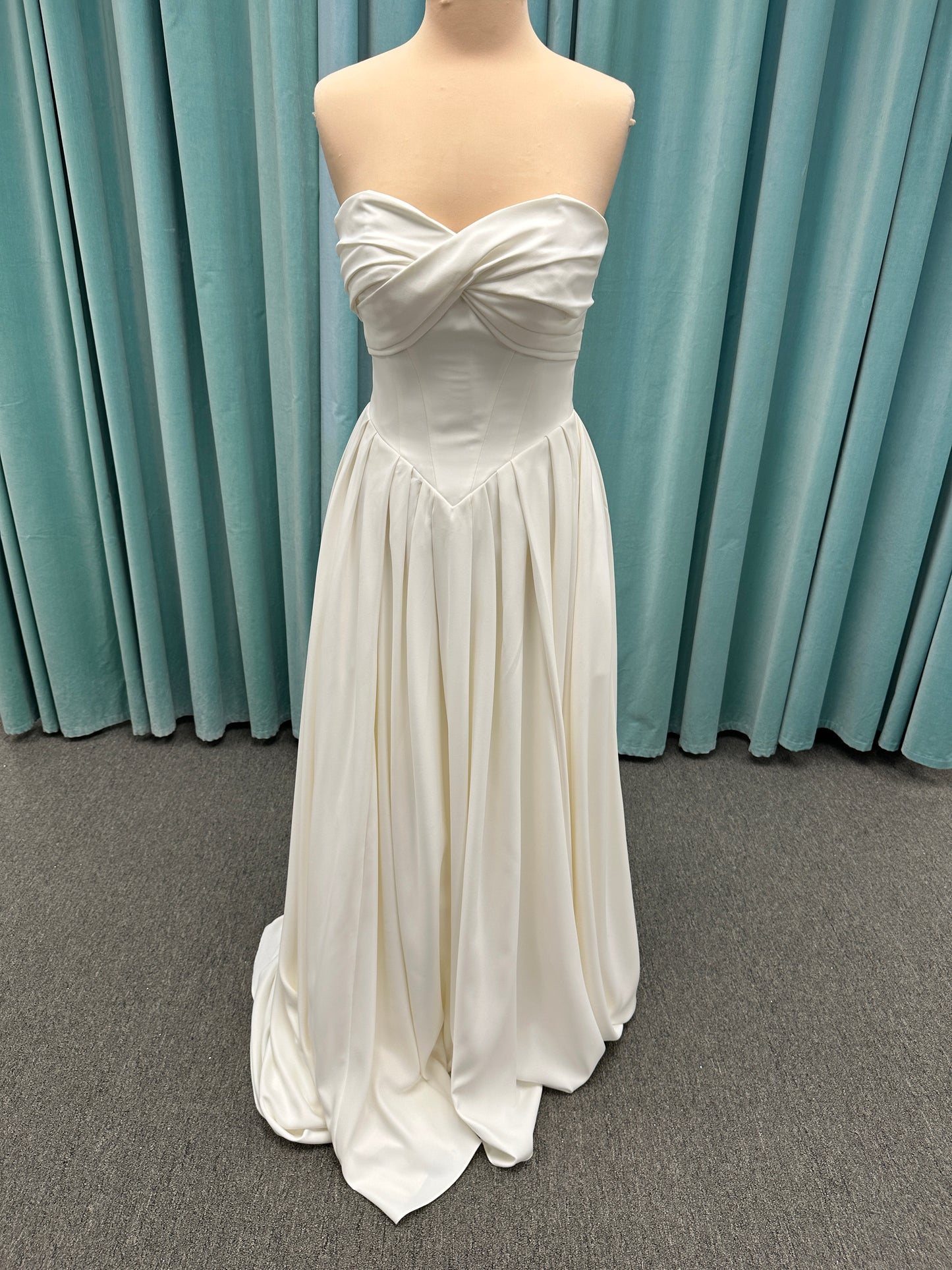 Essense of Australia D4269 matte satin A-line wedding dress with strapless draped bodice and Basque waist
