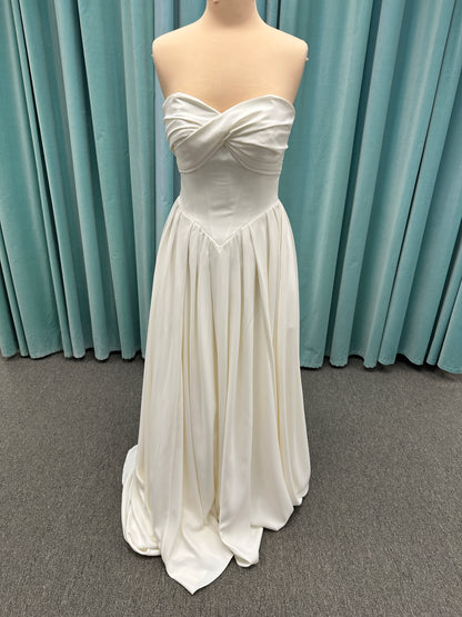 Essense of Australia D4269 matte satin A-line wedding dress with strapless draped bodice and Basque waist