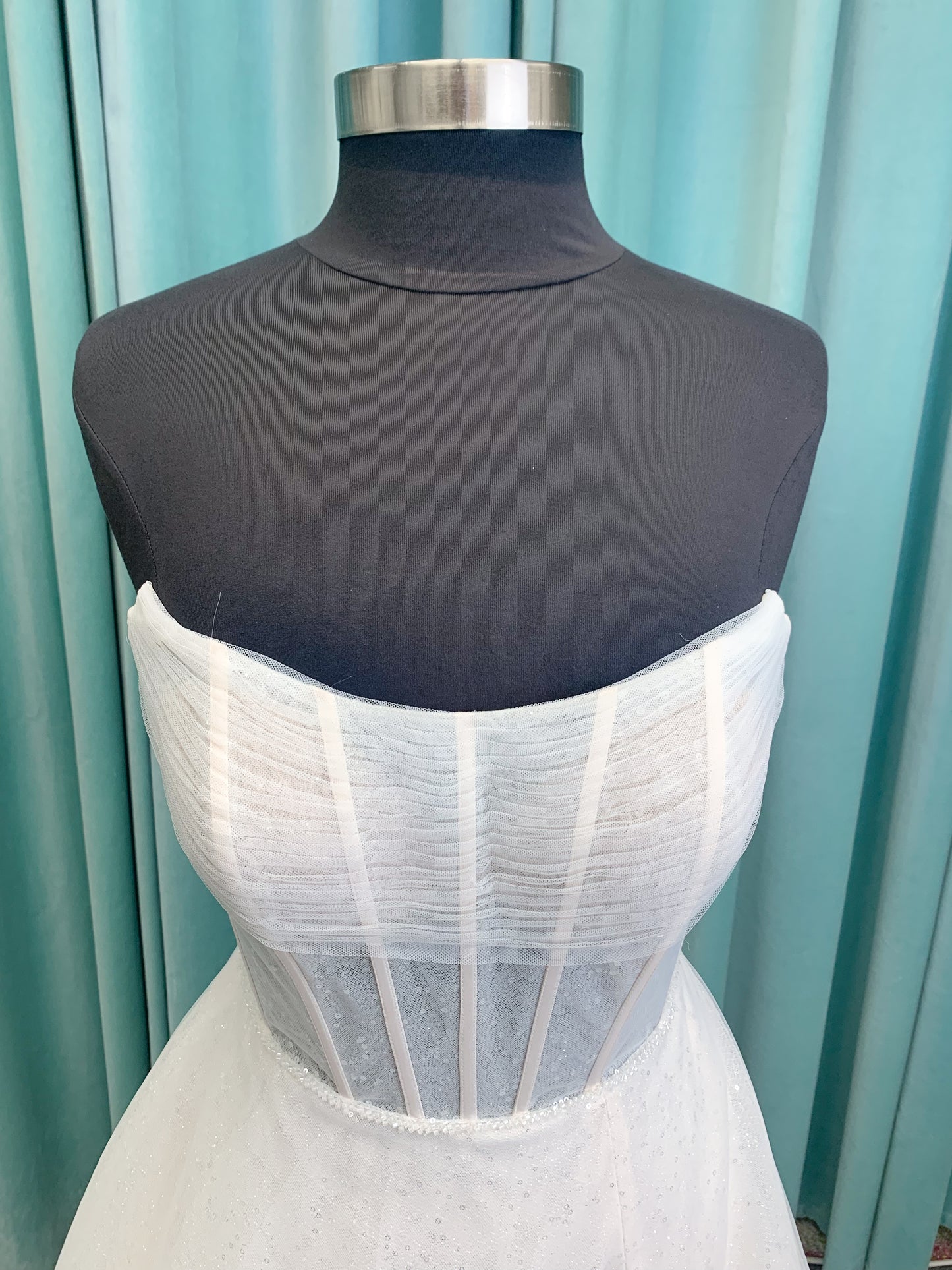 Morilee 15062 Tara A-line wedding dress in sparkle tulle over metallic net with strapless scoop neck, corset boning, and high front slit in Ivory/Champagne/Honey.