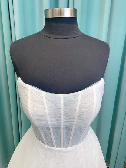 Morilee 15062 Tara A-line wedding dress in sparkle tulle over metallic net with strapless scoop neck, corset boning, and high front slit in Ivory/Champagne/Honey.