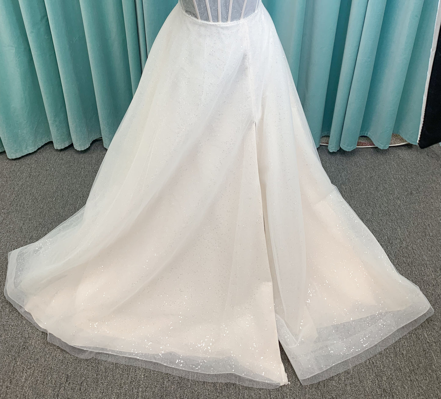 Morilee 15062 Tara A-line wedding dress in sparkle tulle over metallic net with strapless scoop neck, corset boning, and high front slit in Ivory/Champagne/Honey.