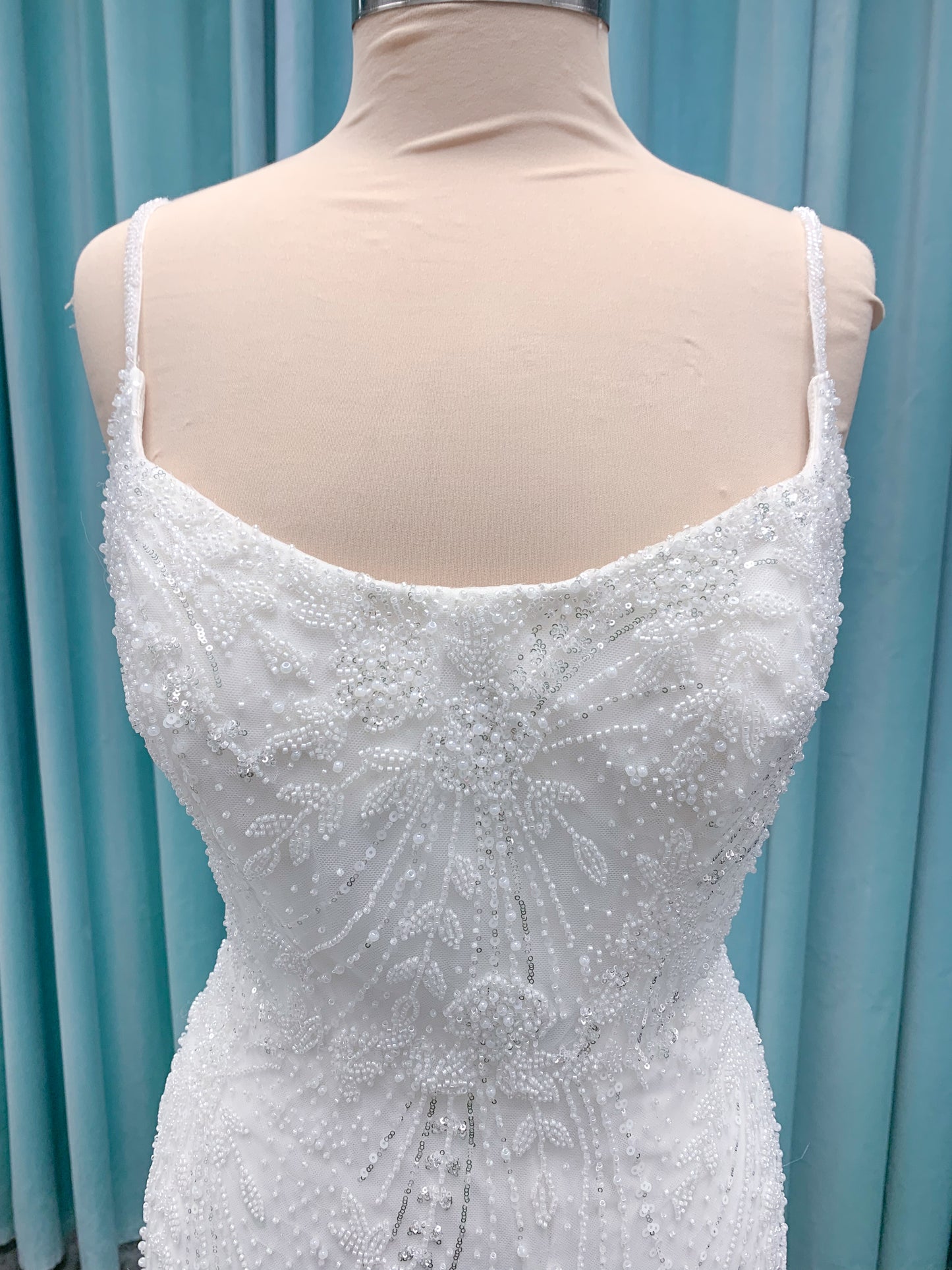 Morilee 1362 Tatianna fit and flare wedding dress with spaghetti straps, allover pearl and crystal beaded net, and sheer corset-boned back in Ivory/Champagne/Honey.