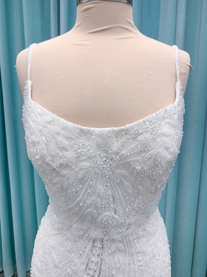 Morilee 1362 Tatianna fit and flare wedding dress with spaghetti straps, allover pearl and crystal beaded net, and sheer corset-boned back in Ivory/Champagne/Honey.