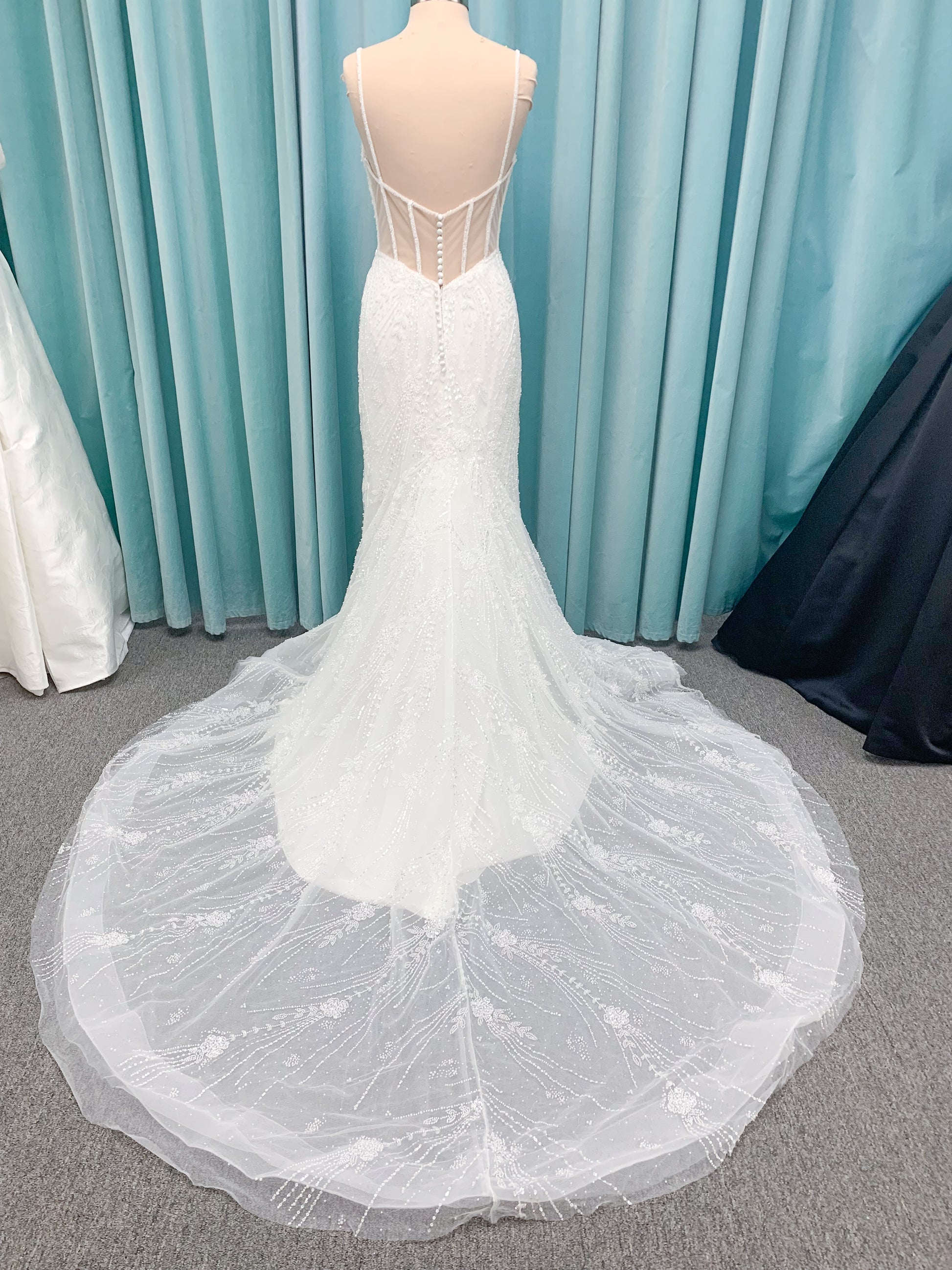 Morilee 1362 Tatianna fit and flare wedding dress with spaghetti straps, allover pearl and crystal beaded net, and sheer corset-boned back in Ivory/Champagne/Honey.