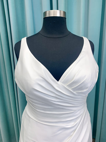 Morilee 3437 Tia plus size A-line wedding dress in stretch Larissa satin with V-neckline, sheer corset back, front slit, and classic buttons to hem.