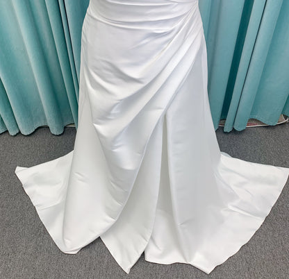 Morilee 3437 Tia plus size A-line wedding dress in stretch Larissa satin with V-neckline, sheer corset back, front slit, and classic buttons to hem.