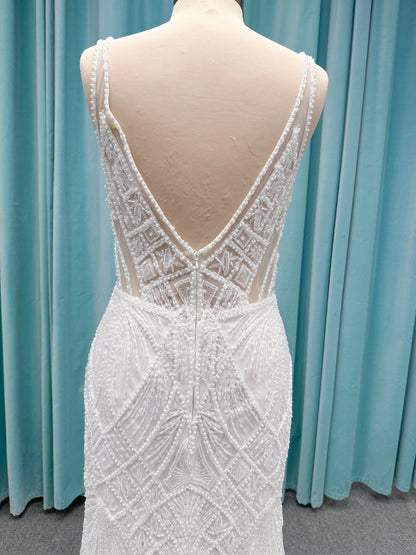 Tori Fit and Flare Wedding Dress in Ivory/Light Champagne, Size 14 — intricate beading, geometric embellishments, fit and flare silhouette