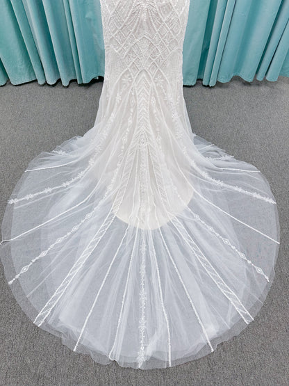Tori Fit and Flare Wedding Dress in Ivory/Light Champagne, Size 14 — intricate beading, geometric embellishments, fit and flare silhouette