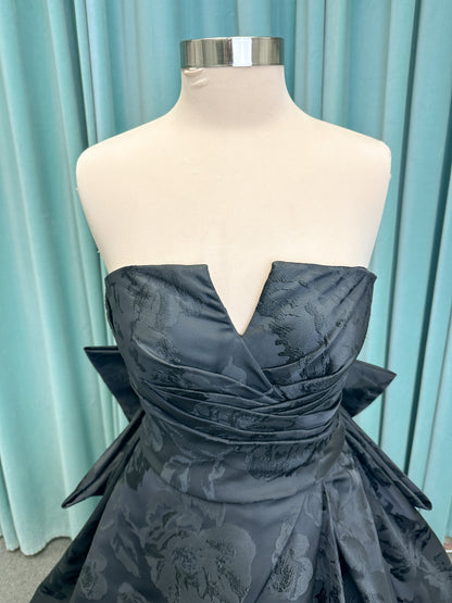 Wednesday Ballgown Wedding Dress in Black Brocade, Size 10 — floral jacquard, strapless neckline, oversized bow back