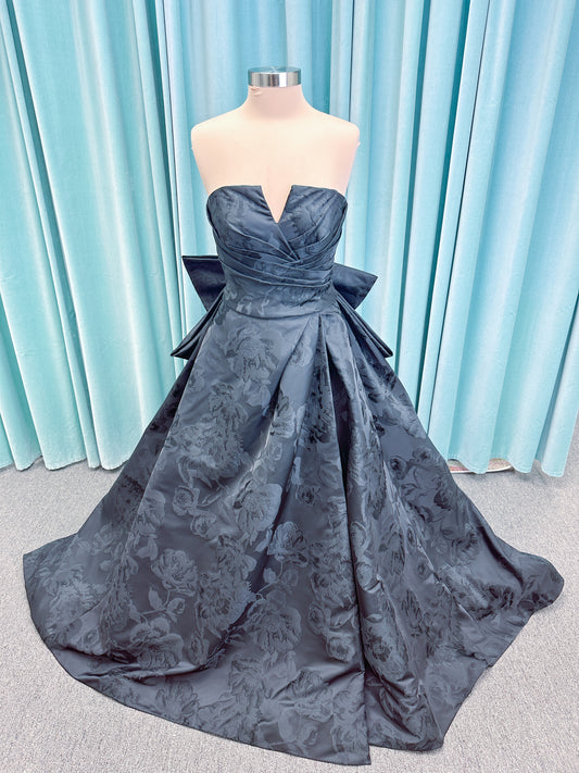 Wednesday Ballgown Wedding Dress in Black Brocade, Size 10 — floral jacquard, strapless neckline, oversized bow back