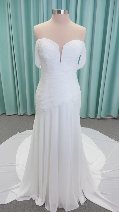 Morilee 15053 Parvati ballgown wedding dress on mannequin with draped chiffon bodice, plunging sweetheart neckline, and detachable off-the-shoulder sleeves