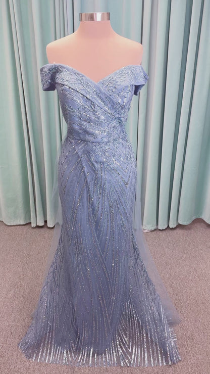 Morilee MLNY 73110 mermaid mother of the bride dress on mannequin with off-the-shoulder sweetheart neckline with foldover cuff, sequin-beaded net bodice, sheer tulle back panel, and sweep train