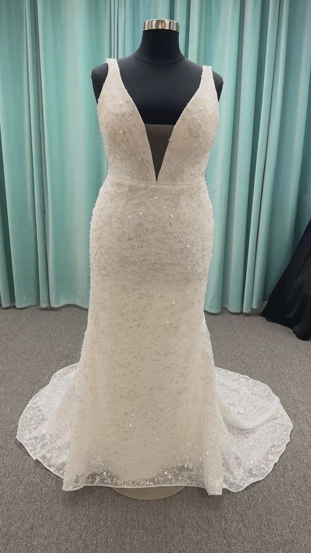 Plus size beaded lace column wedding dress with plunging V neckline, illusion tulle inset, and low V back by Stella York Style 8006