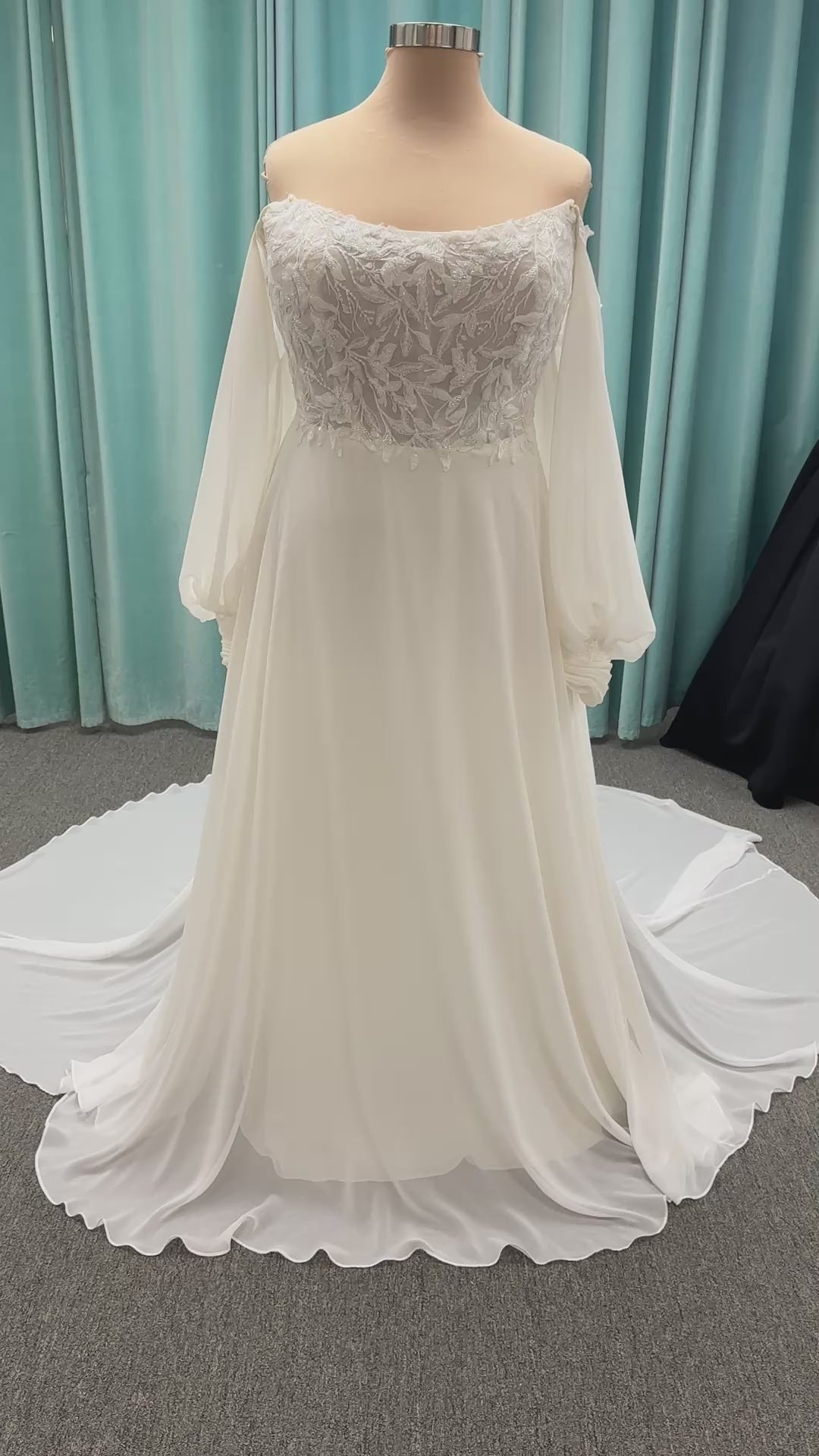 Plus size lace A-line wedding dress with detachable long blouson sleeves and flowing chiffon skirt