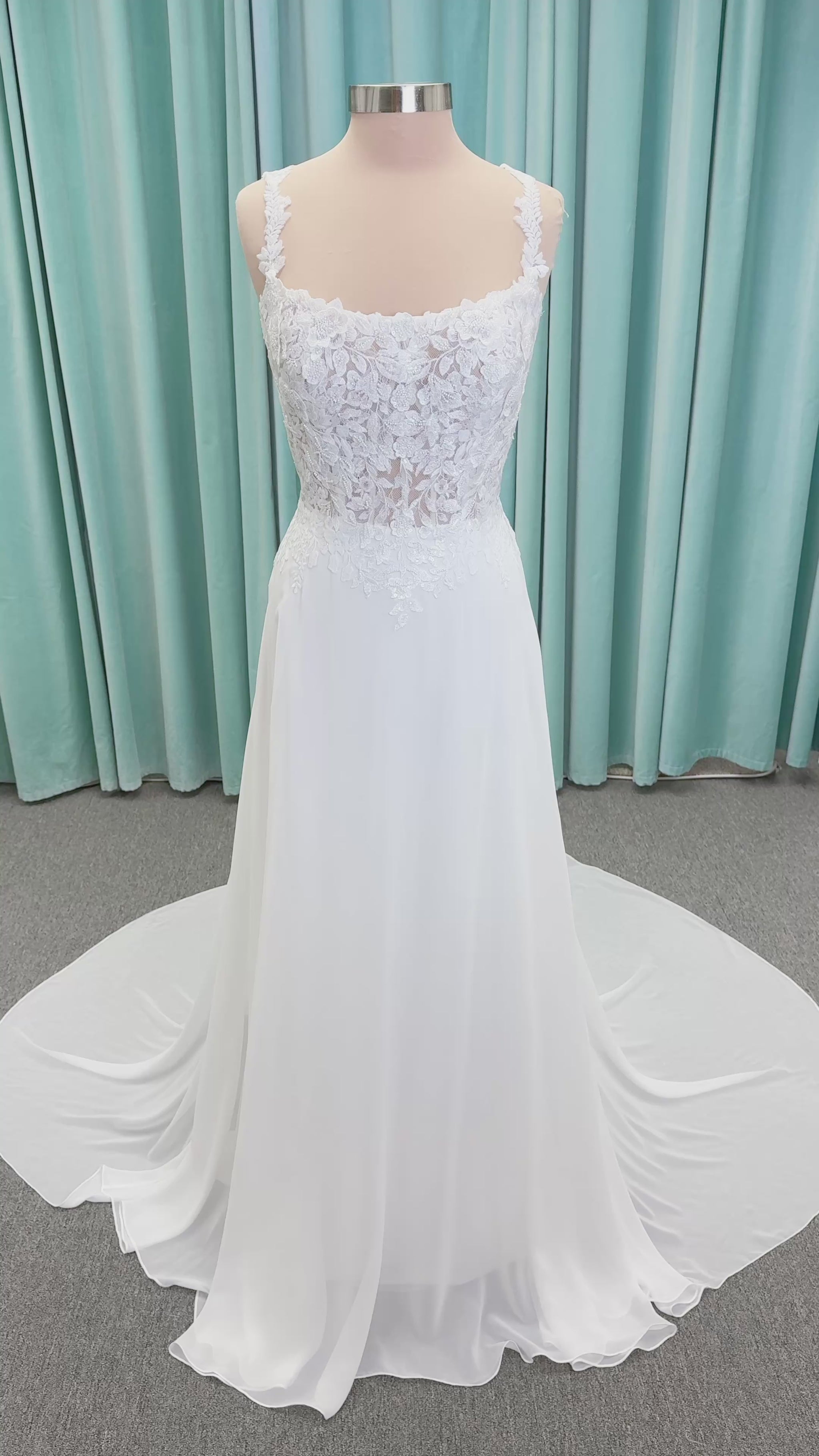 Morilee 15108 Senna boho A-line wedding dress on mannequin with square neckline, 3D floral lace bodice, and flowing chiffon skirt