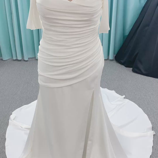 Morilee 4473 Reba plus size A-line wedding dress in Larissa satin with cowl strapless neck, detachable organza bow tie straps, and covered buttons to hem.