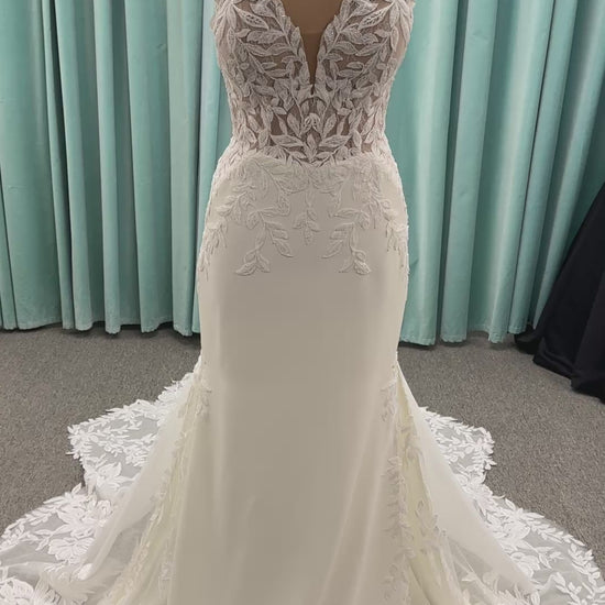Essense of Australia D4037 crepe sheath wedding dress with plunging V-neckline, sheer lace bodice, side cutouts, and low back with lace train